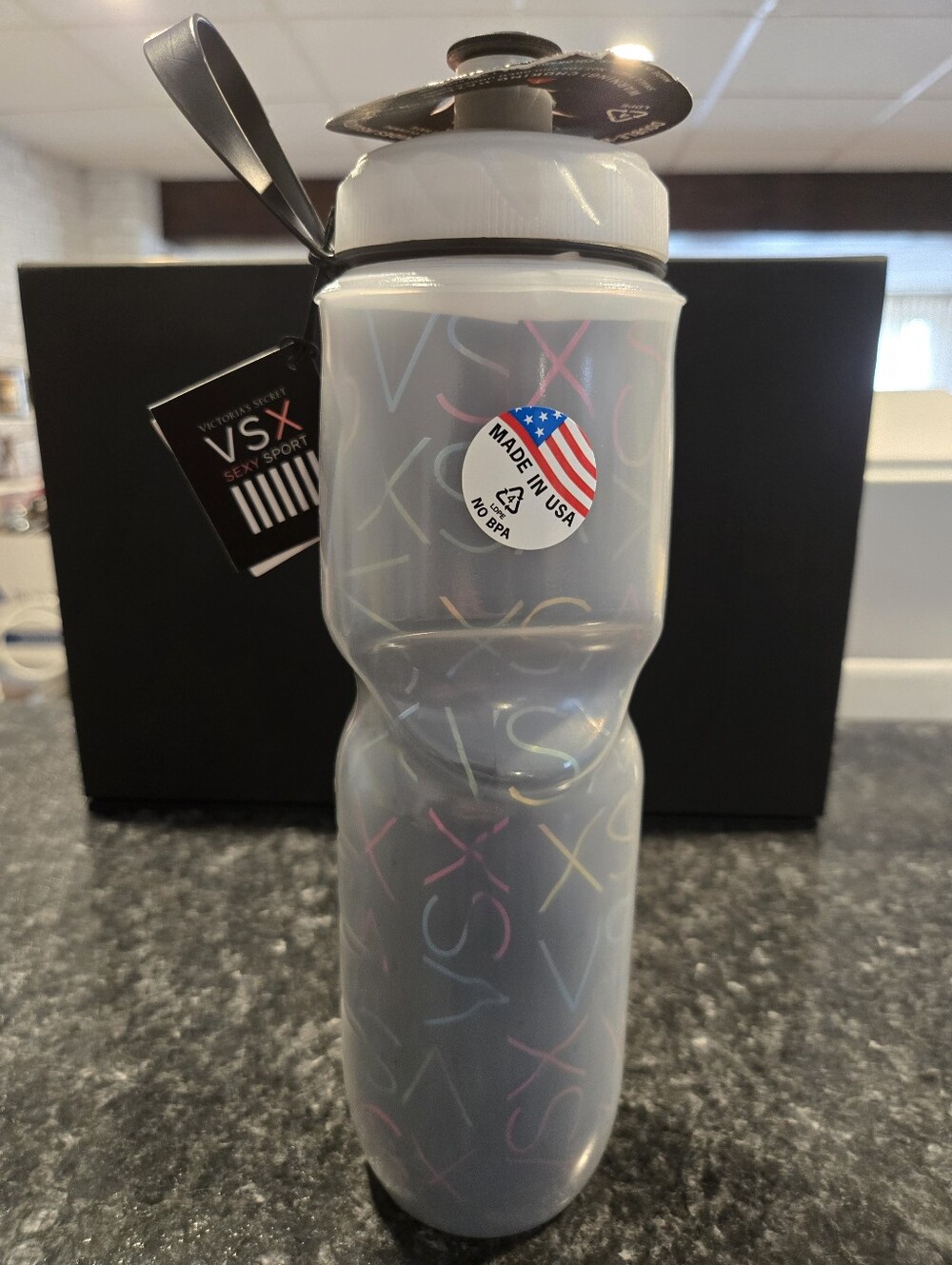 Victoria's Secret Gray VSX Bottle with Pastel Logo Accents